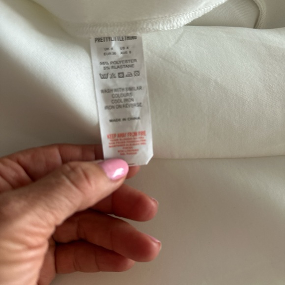 PRETTY LITTLE THING White Bardot Flared Leg Bonded Scuba Jumpsuit - Picture 7 of 7